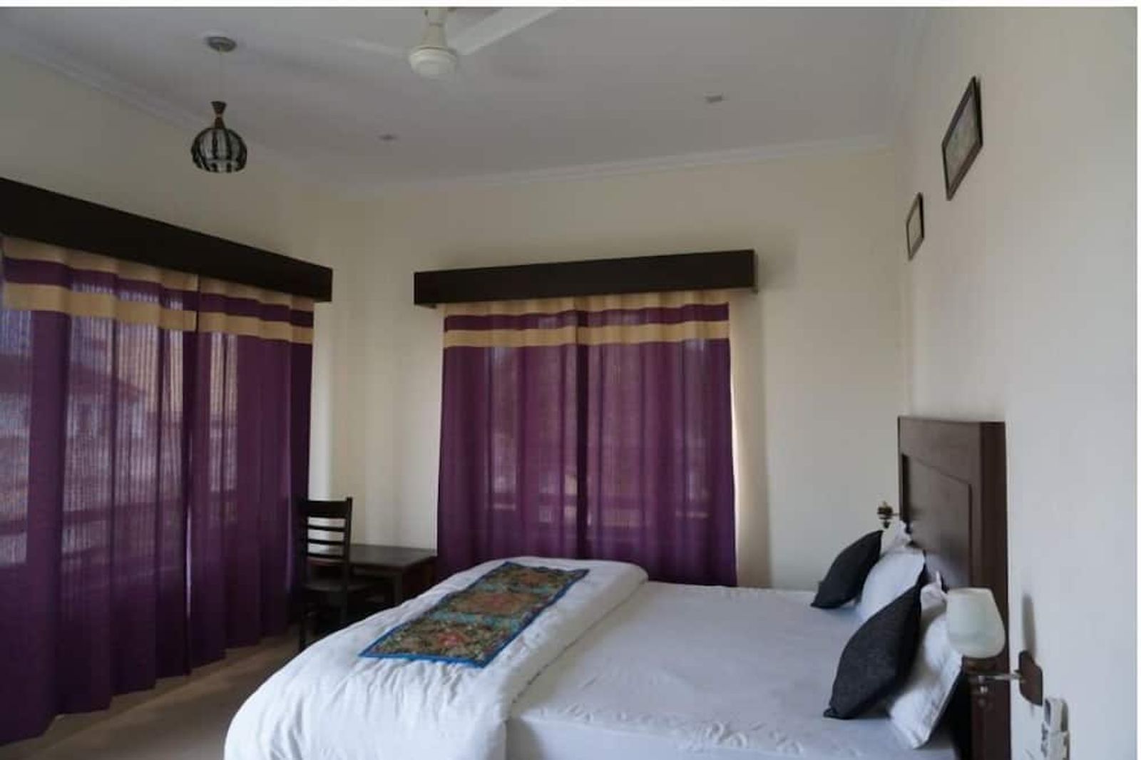 Bright dual-window room at Ramayana Hotel Khajuraho